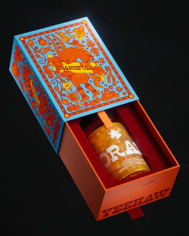 Orange jam in sliding drawer gift box with illustrated blue lid