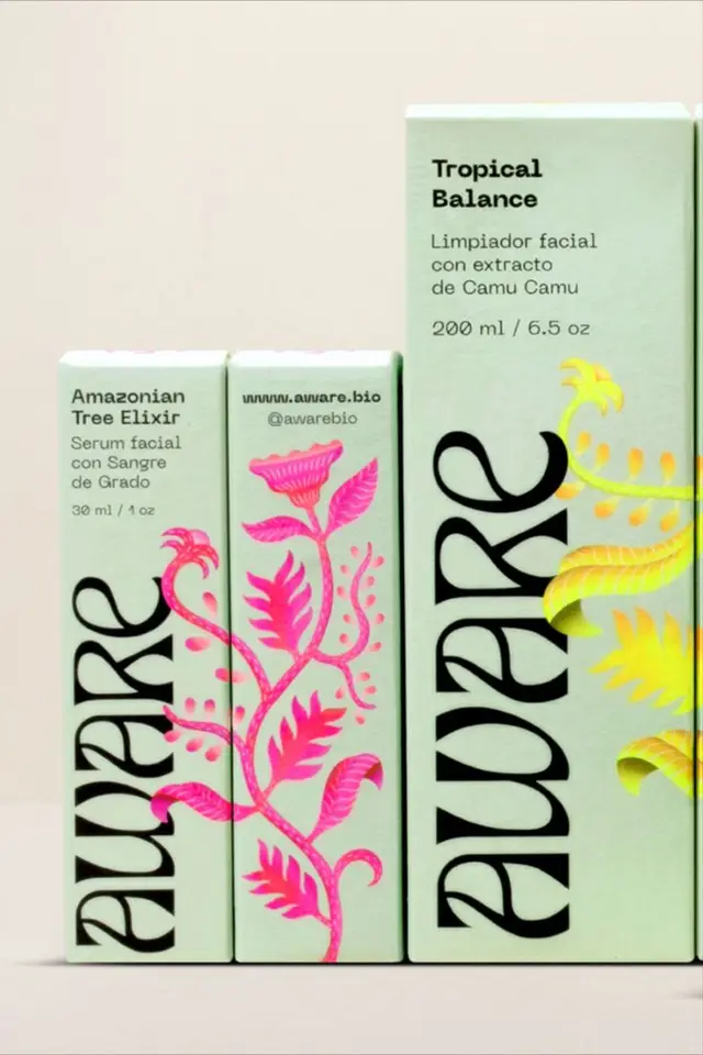 aware.bio mint skincare boxes with pink botanical foil illustration