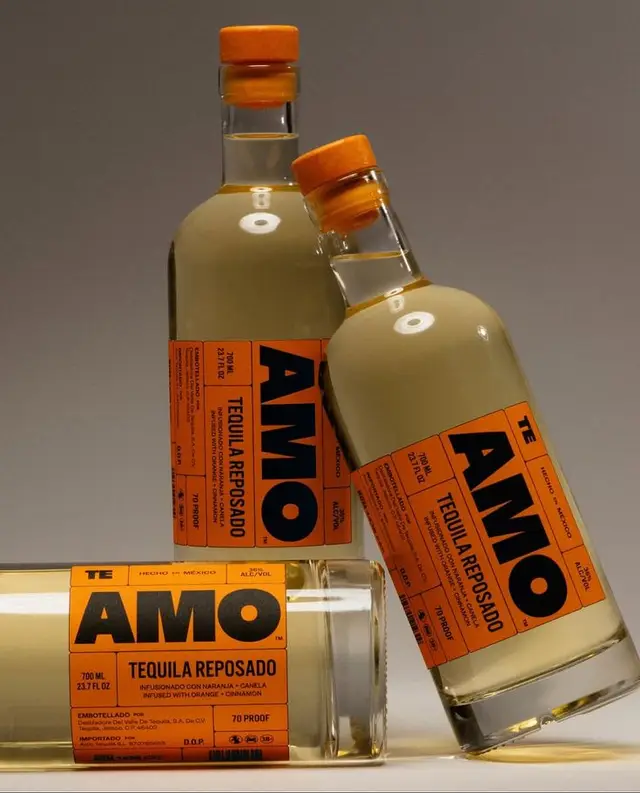 AMO Tequila Reposado — orange-label bottles product photo