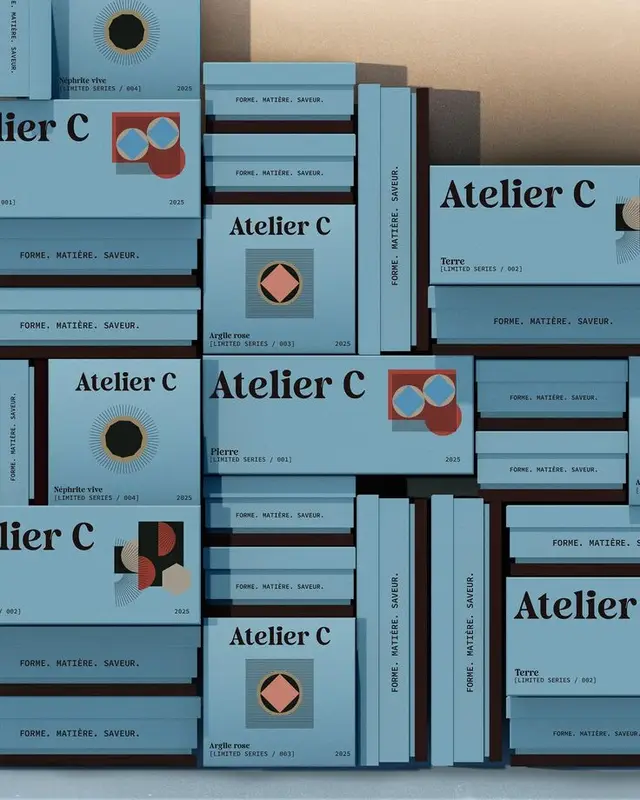 Atelier C limited-edition blue packaging — stacked geometric boxes