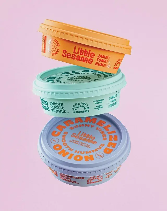 Little Sesame — three pastel hummus tubs stacked product shot