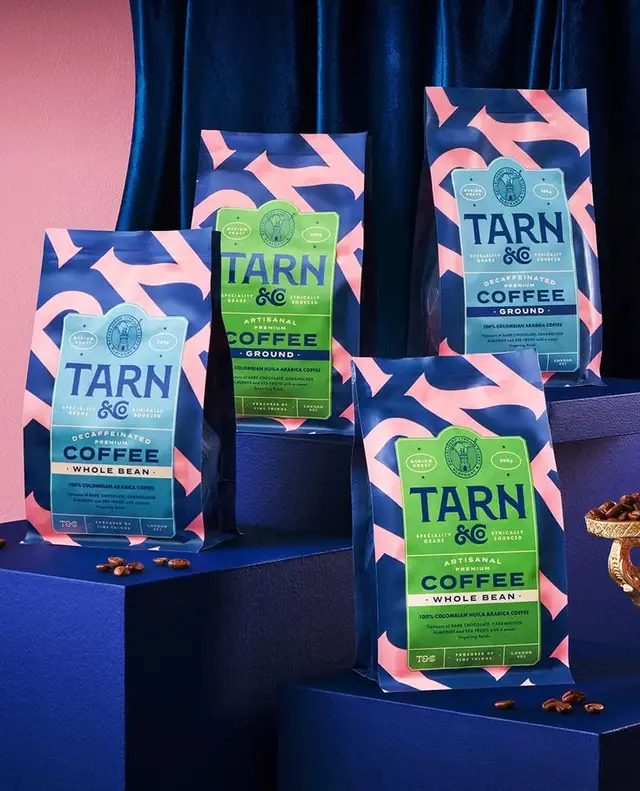 TARN artisanal coffee packaging — navy & coral patterned bags