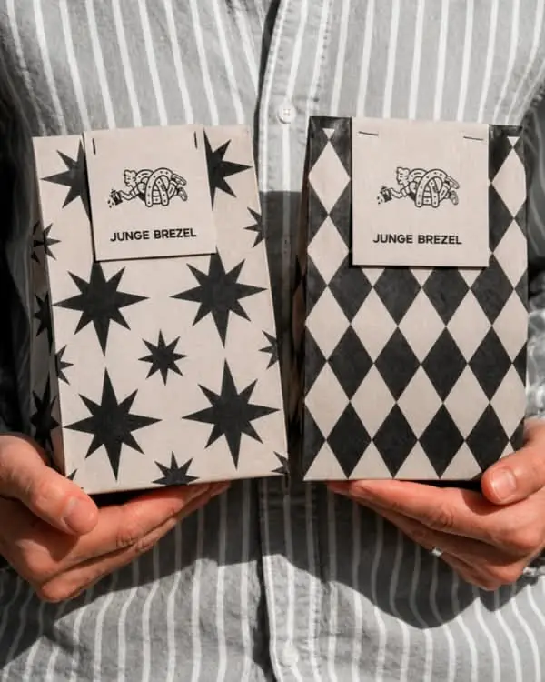 JUNGE BREZEL kraft paper bags — star and harlequin patterns