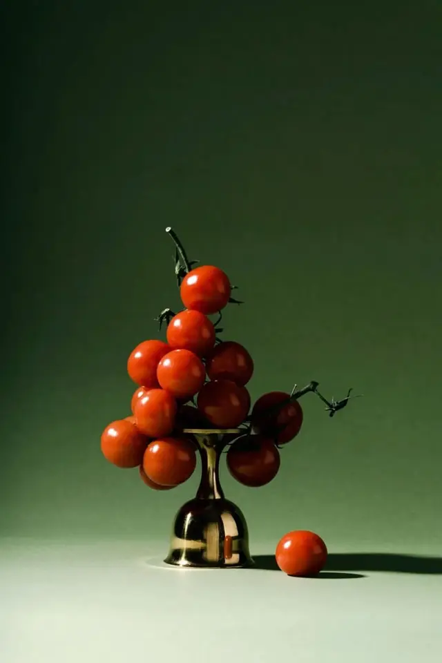 Cherry Tomatoes Cluster on Brass Goblet — Green Minimalist Still Life