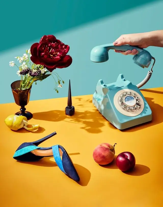 Turquoise Rotary Phone Still Life with Blue Slingback and Red Peony