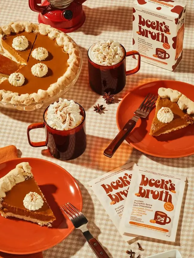 Pumpkin pie and Beck's Broth pumpkin-spice hot chocolate flatlay