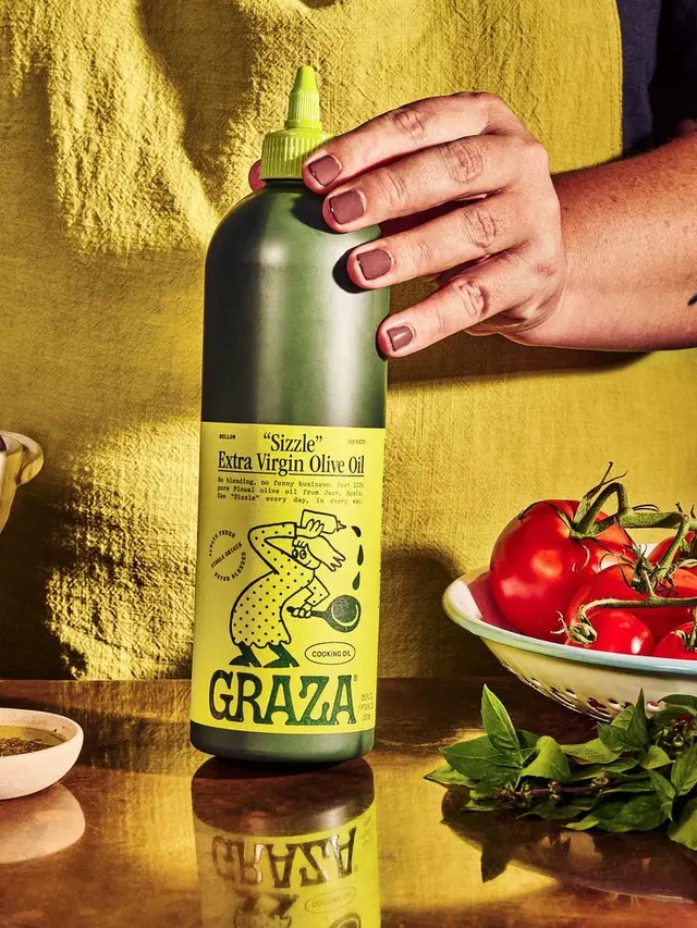 GRAZA "Sizzle" Extra Virgin Olive Oil — editorial kitchen still life