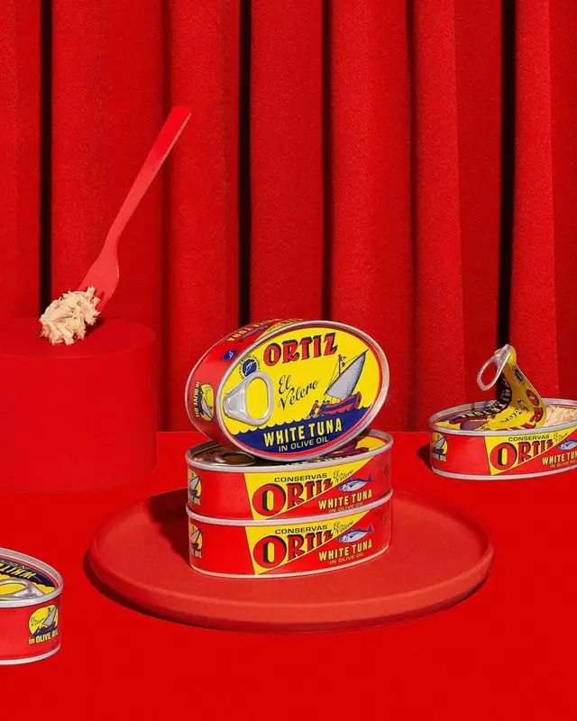 Ortiz White Tuna tins — red monochrome still life