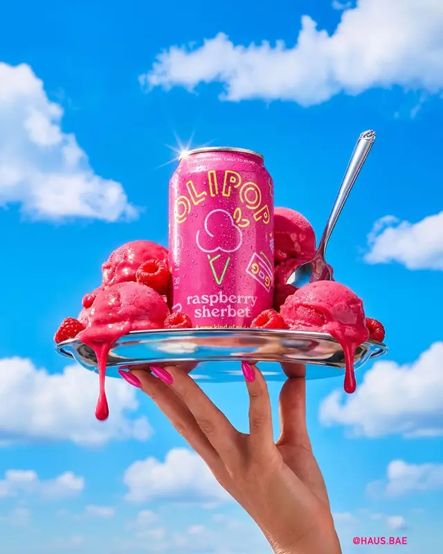 OLIPOP Raspberry Sherbet can with melting raspberry sorbet on chrome platter