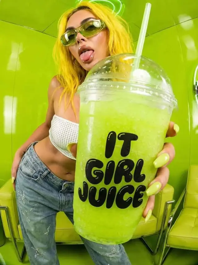 Neon lime slushy cup labeled "IT GIRL JUICE" in green fashion set