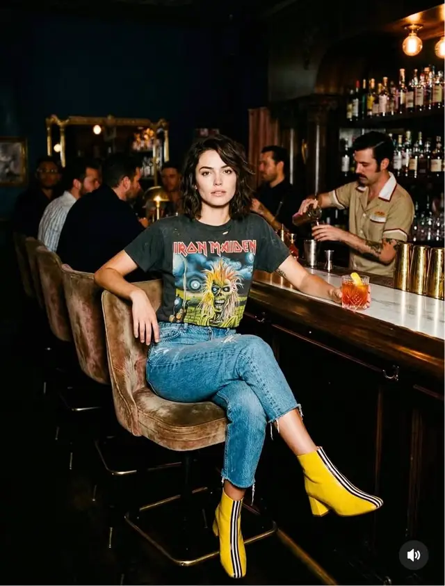 Woman in Iron Maiden T‑Shirt and Yellow Ankle Boots at Marble Bar