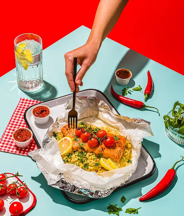 Salmon en Papillote with Couscous & Cherry Tomatoes — Vibrant Food Photo