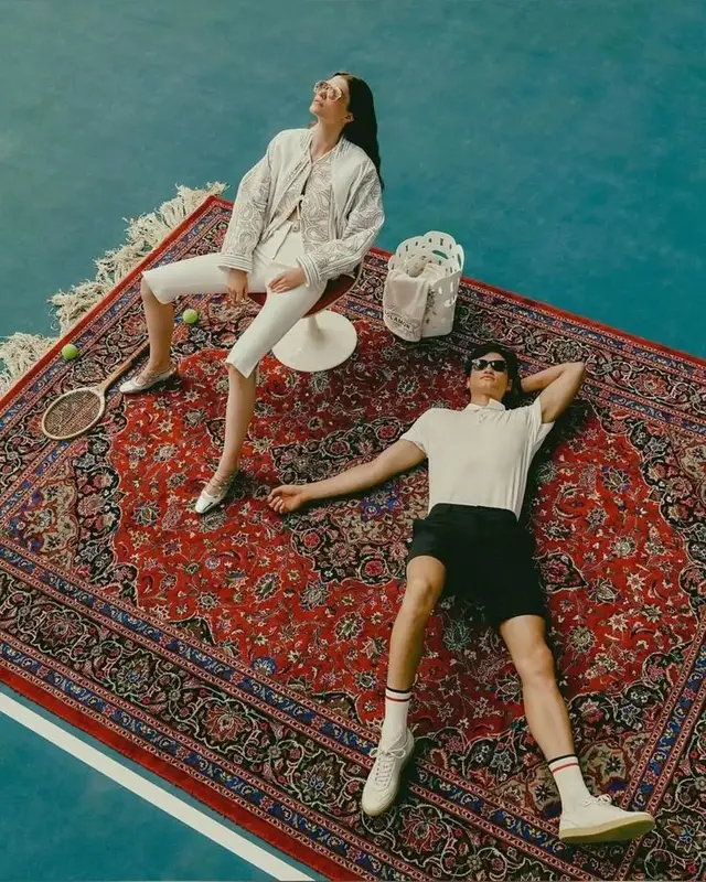 Sport‑Luxe Editorial: Red Persian Rug on Blue Tennis Court