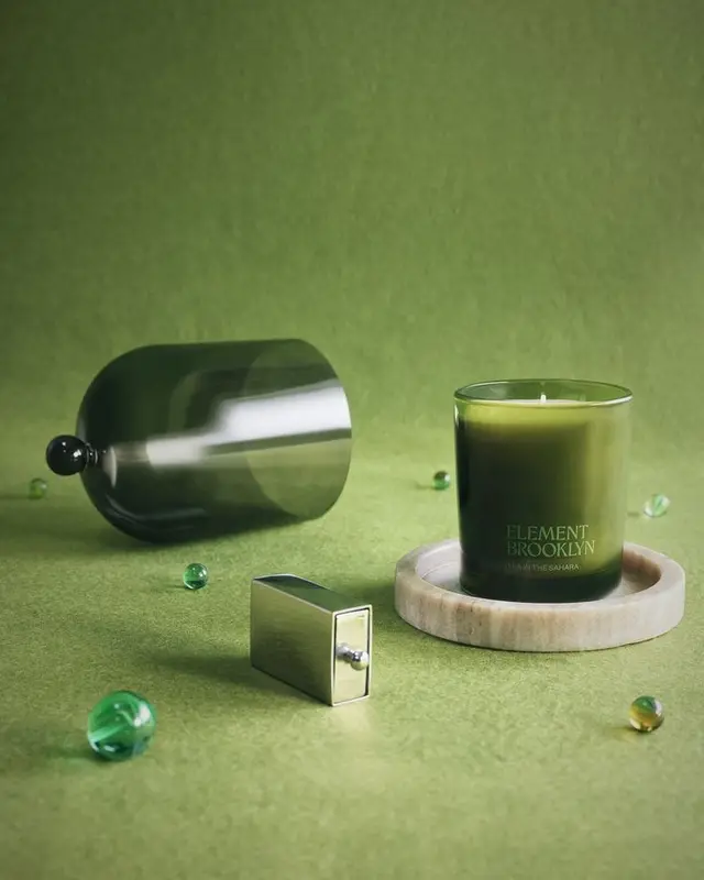 Element Brooklyn green glass candle styled with stone coaster and glass cloche
