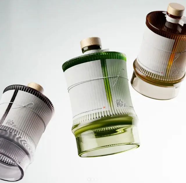 Ribbed Glass Bottles with Paper Wrap Labels and Cork Stoppers — Minimal Packaging