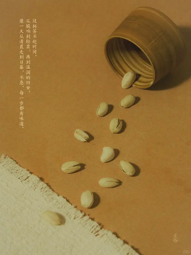 Pistachios spilling from bamboo tea canister — warm minimal still life