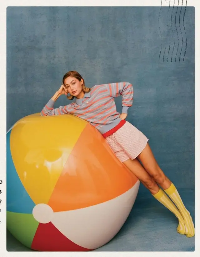 Model Leaning on Giant Inflatable Beach Ball — Editorial Fashion Portrait