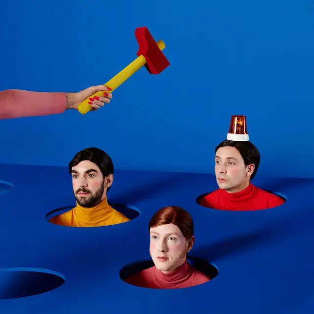 Whack-a-Mole–Style Studio Portrait with Toy Mallet