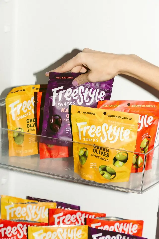 FreeStyle Snacks olive pouches on clear fridge shelf
