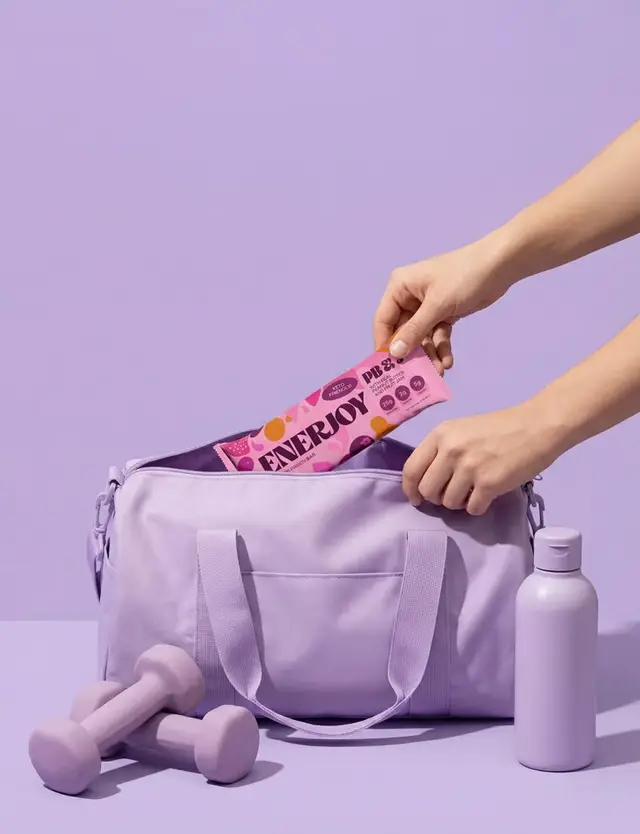 Lavender gym duffel with Enerjoy bar, dumbbells and water bottle