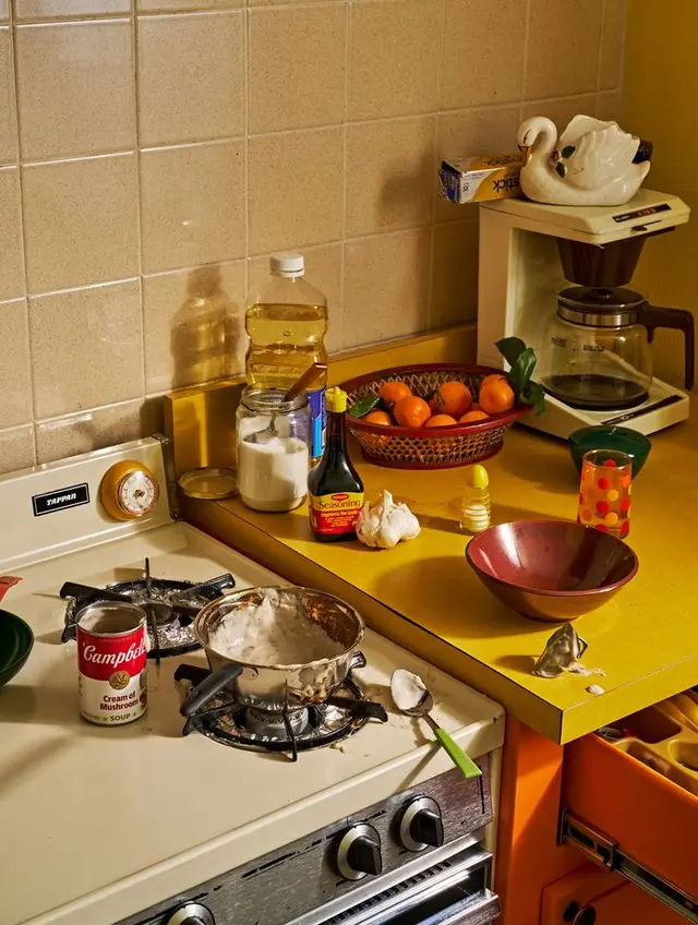 Retro yellow kitchen countertop with Campbell's soup and mixing pan
