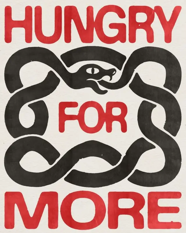 Bold poster: 'HUNGRY FOR MORE' with coiled black snake