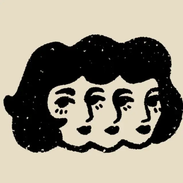 Three-faced black ink block print on cream paper