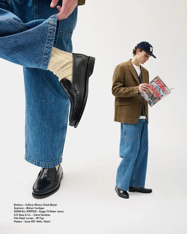Menswear editorial — baggy Baker jeans, tweed blazer, black leather loafers